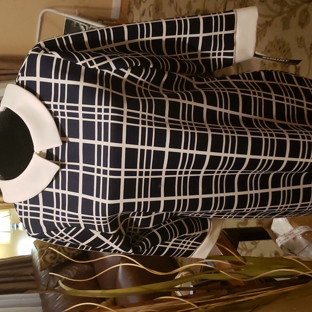 Navy and white window pane dress. 3/4 sleeves.